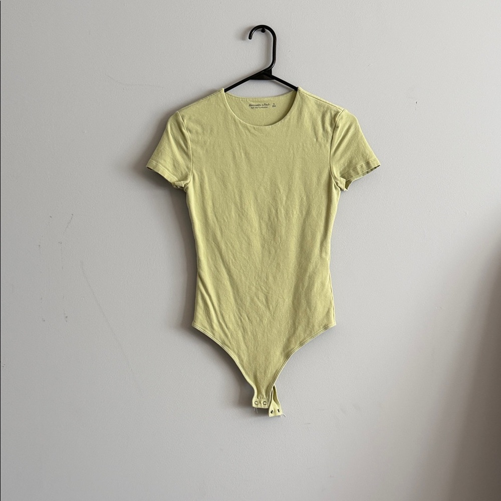 Abercrombie & Fitch Pastel Yellow Short Sleeve Bodysuit